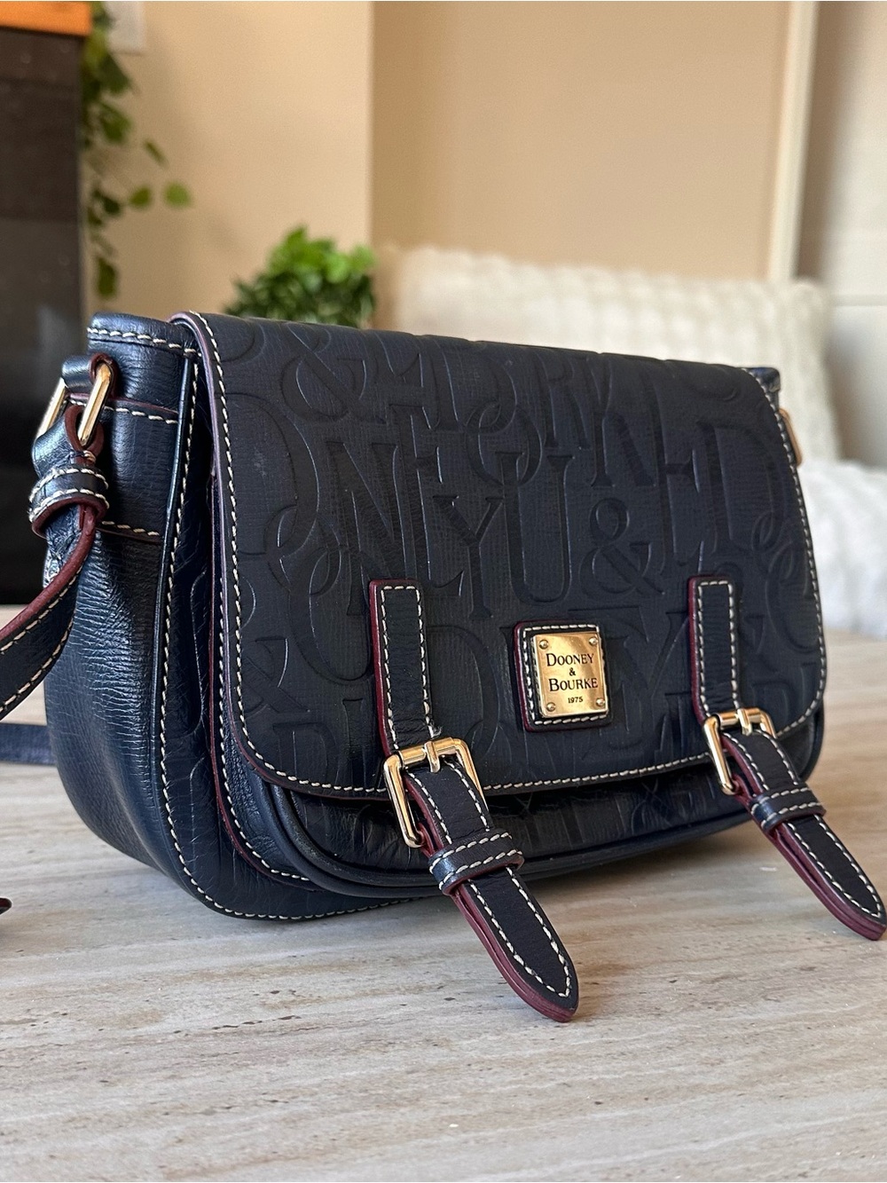 Dooney & Bourke Black Embossed Flap Crossbody with Burgundy Trim
